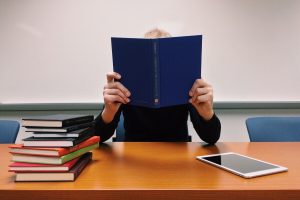 student with a book